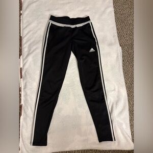 Adidas Black Joggers with Iconic Stripes and Tapered Fit